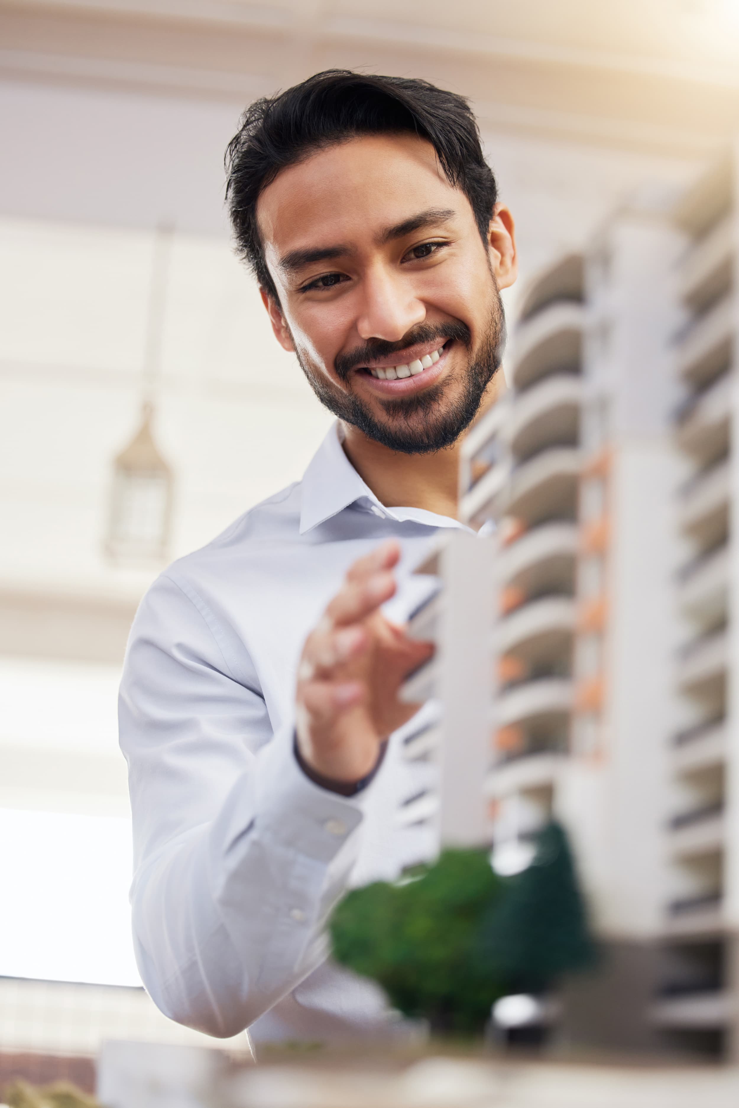 man interacting with dummy building